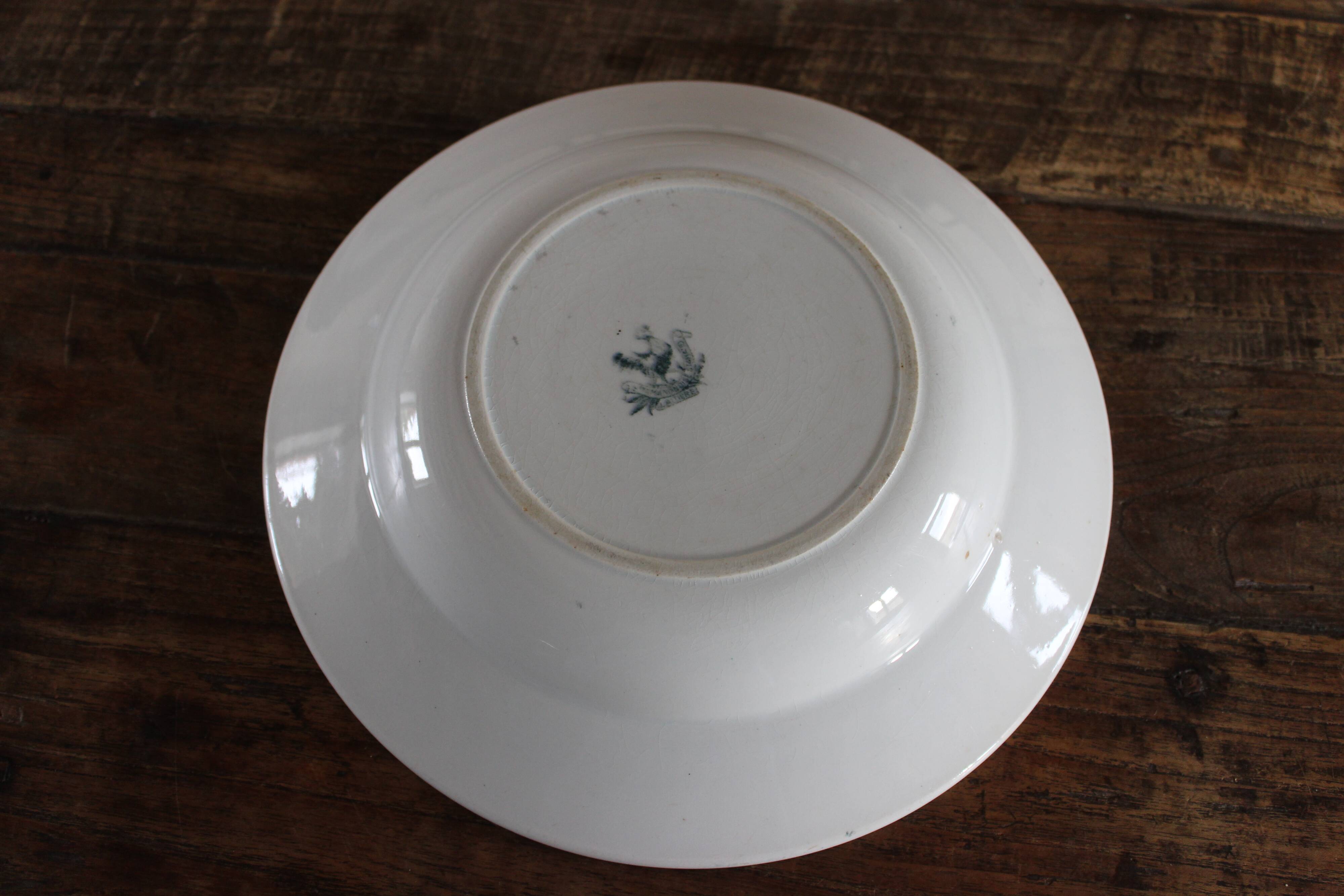Round hollow dish, Iron earth, Saint Amand, milkmaid model, goat decoration