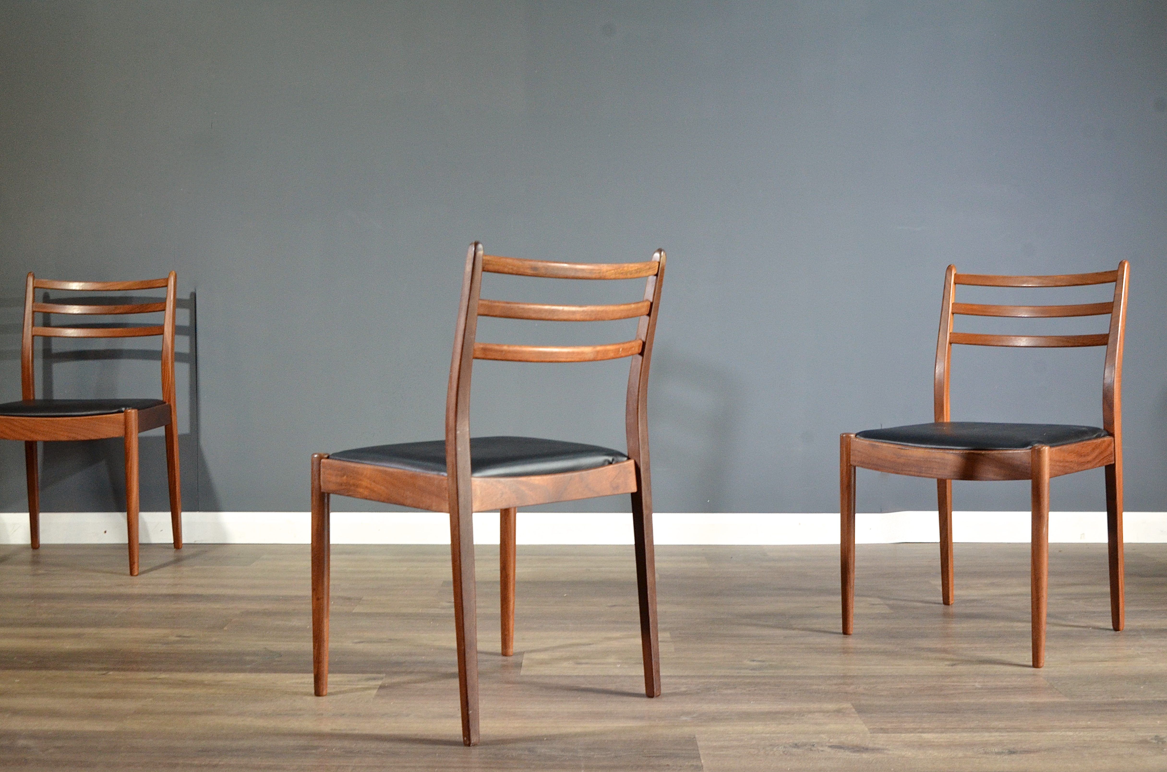Set of 4 chairs by G Plan in teak and leatherette