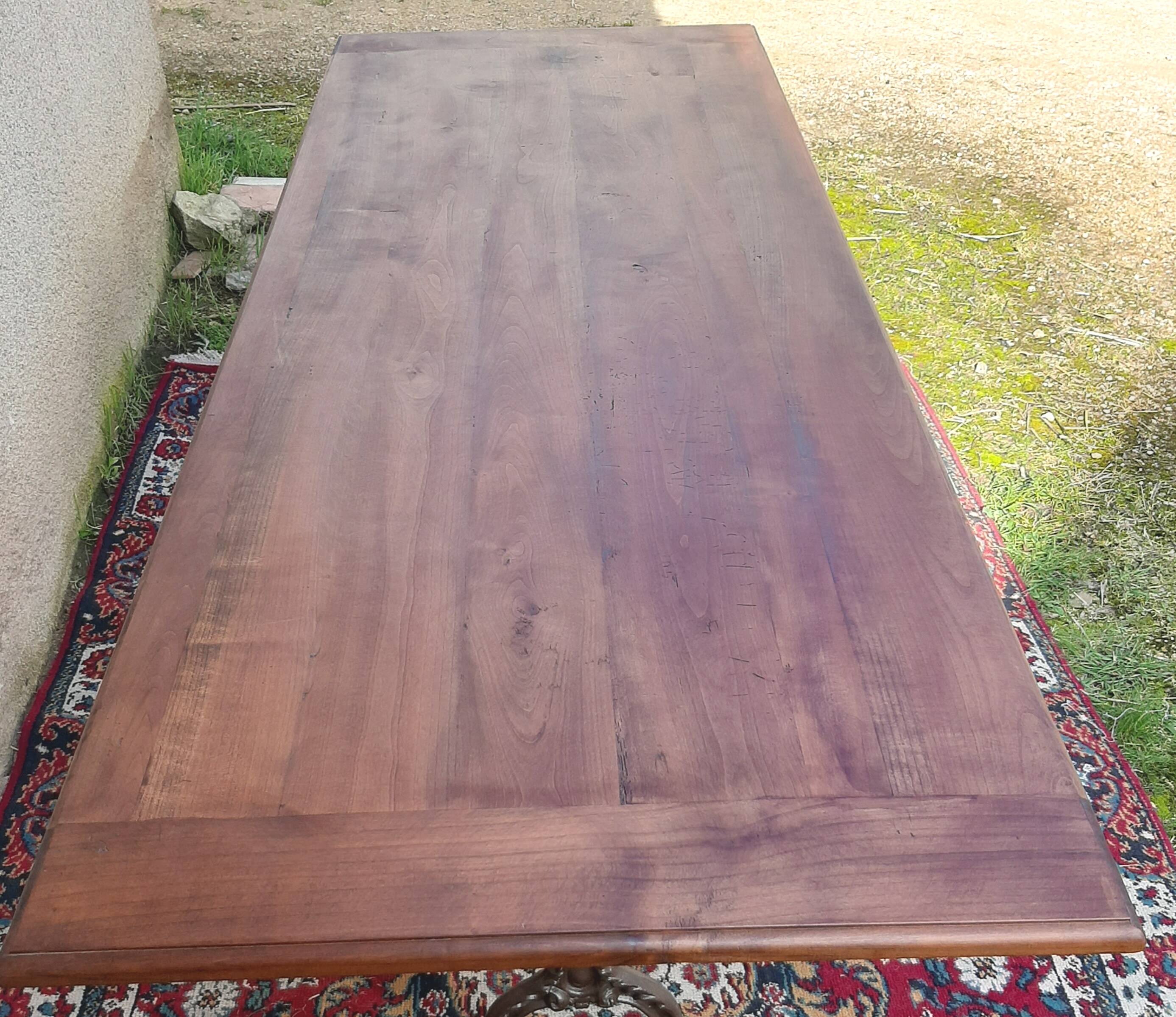 Large bistro table with cast iron legs and cherry top