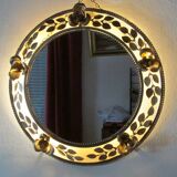 Round gold metal mirror, rose crown