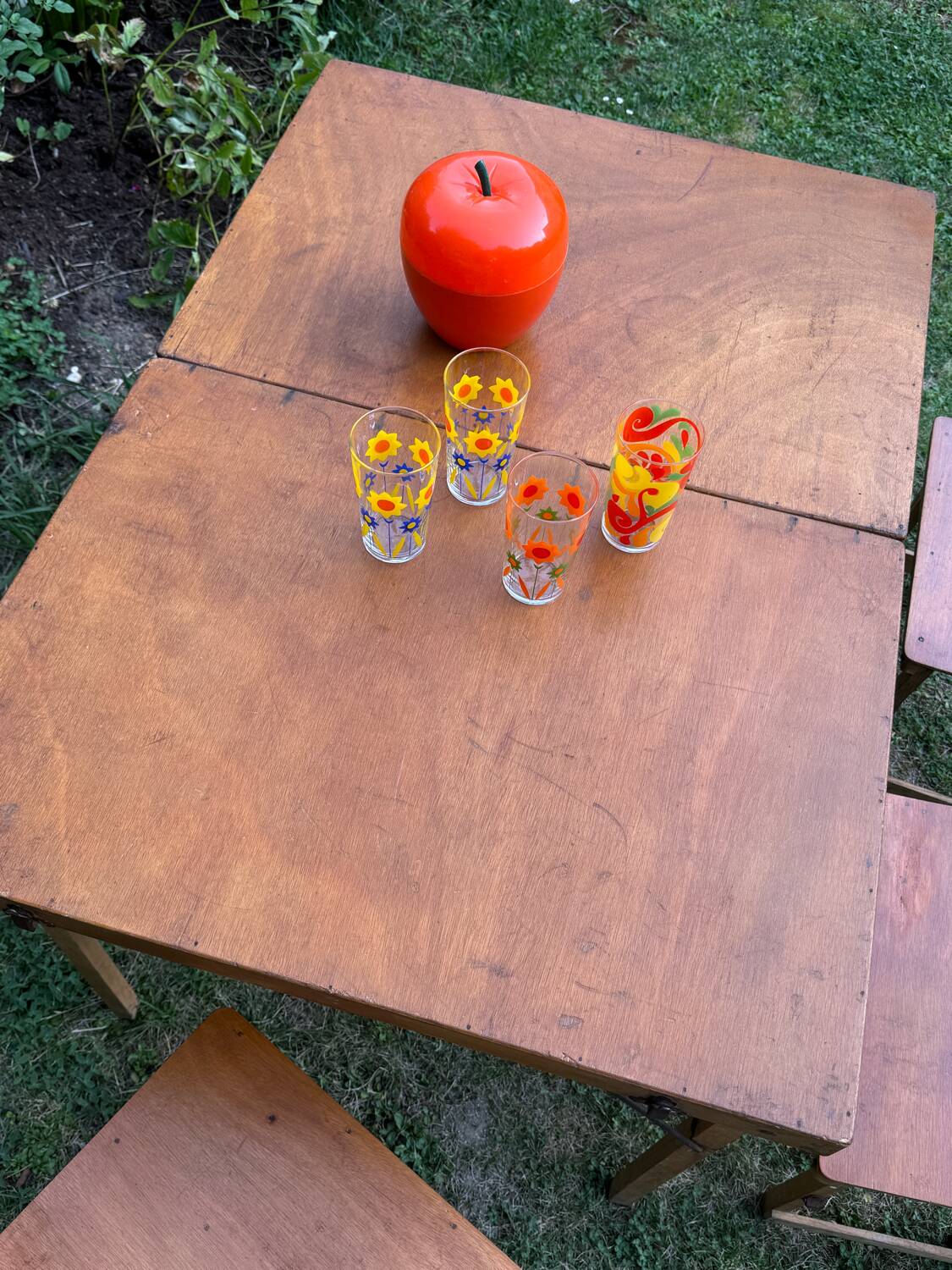 Old suitcase, table and stools, vintage wooden picnic