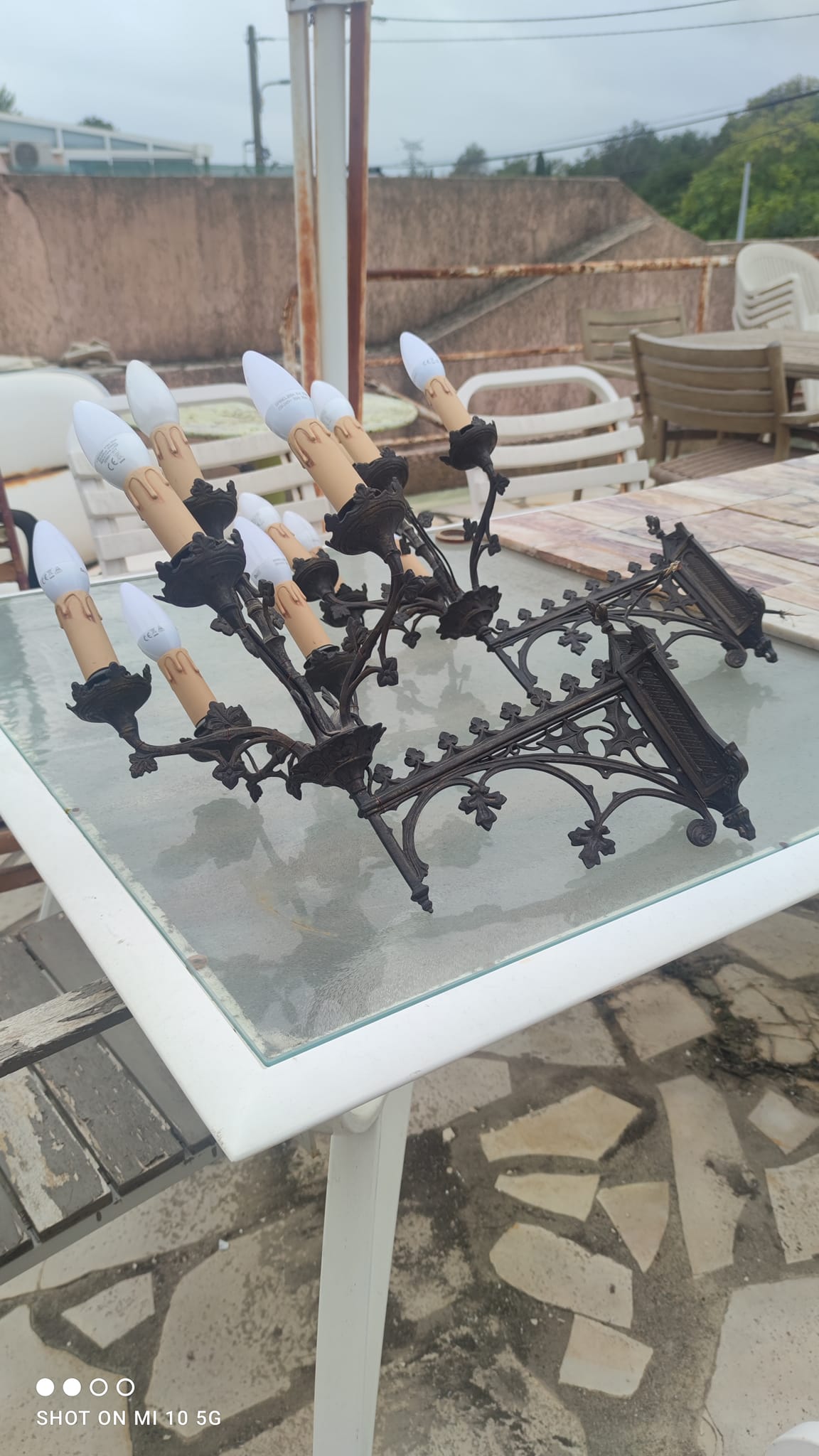 Pair of 19th-century bronze cathedral wall sconces with 5 lights