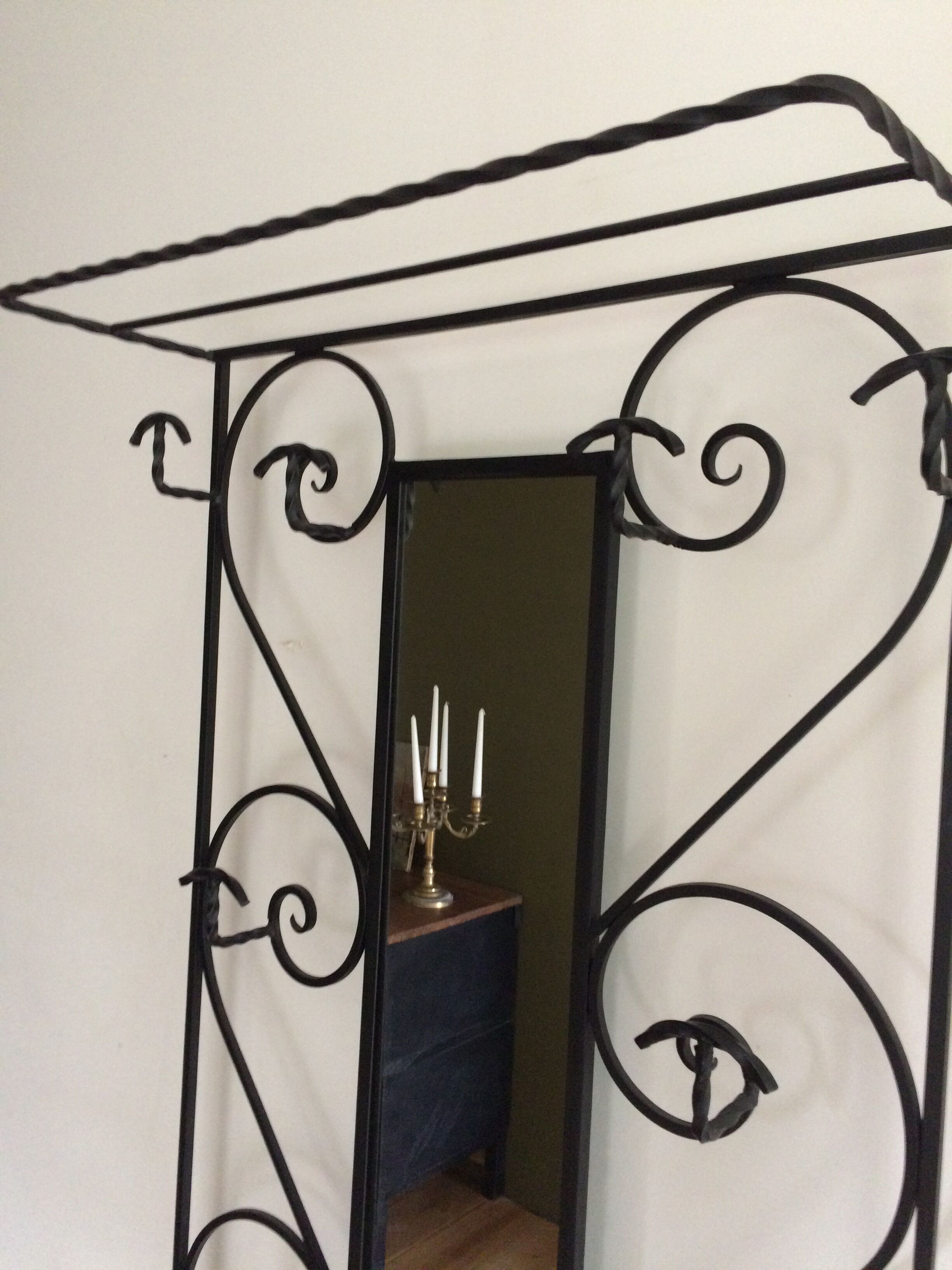 Wrought iron coat holder