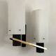 Arlus opaline and vintage steel wall light from the 1950s