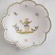 3 small signed Moustiers decorated plates with lace