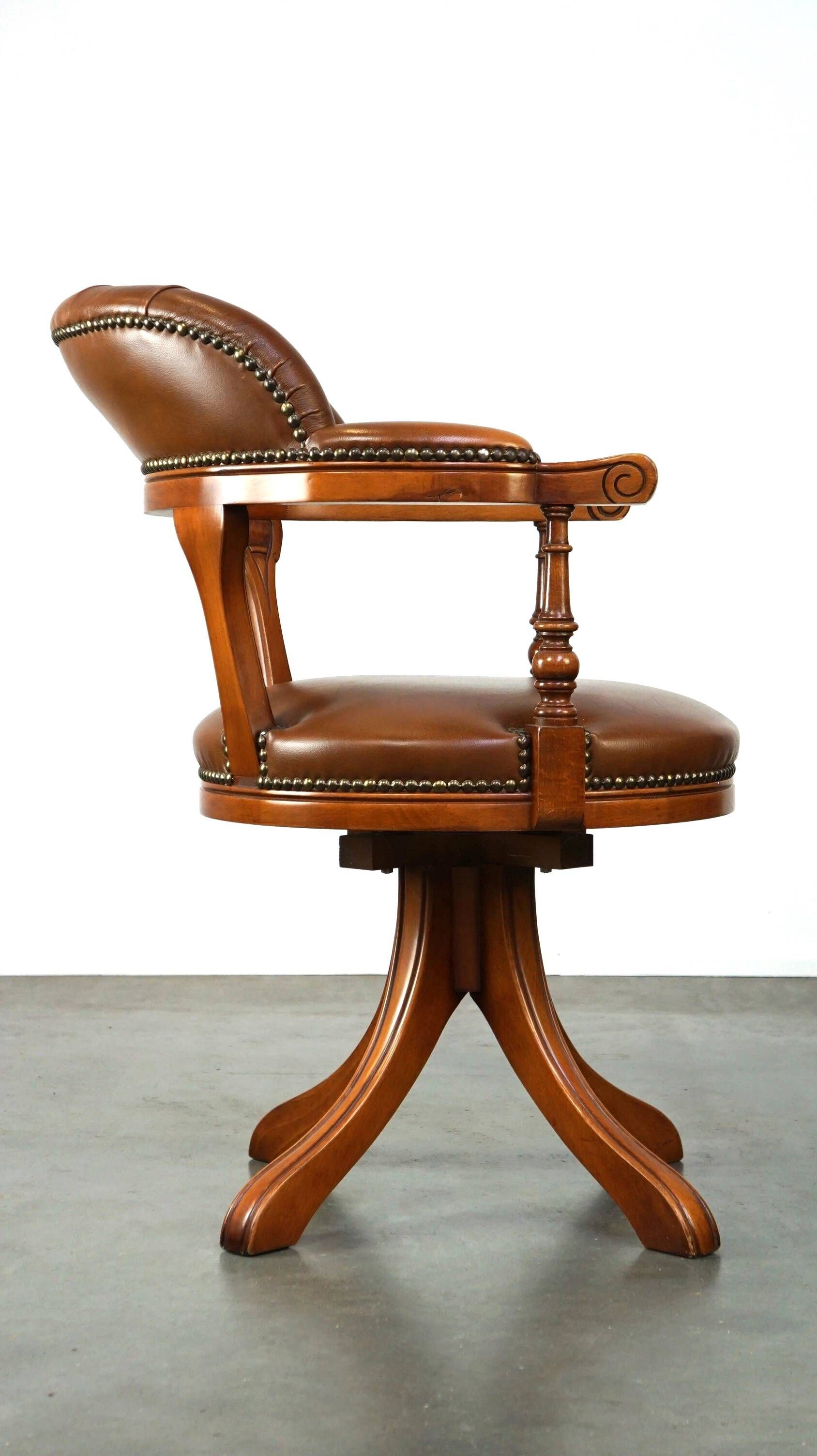 Swivel English style Chesterfield armchair/office chair in brown cowhide