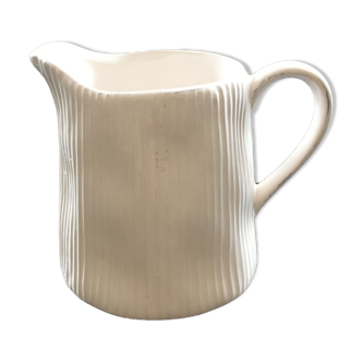 White pitcher streaked in relief