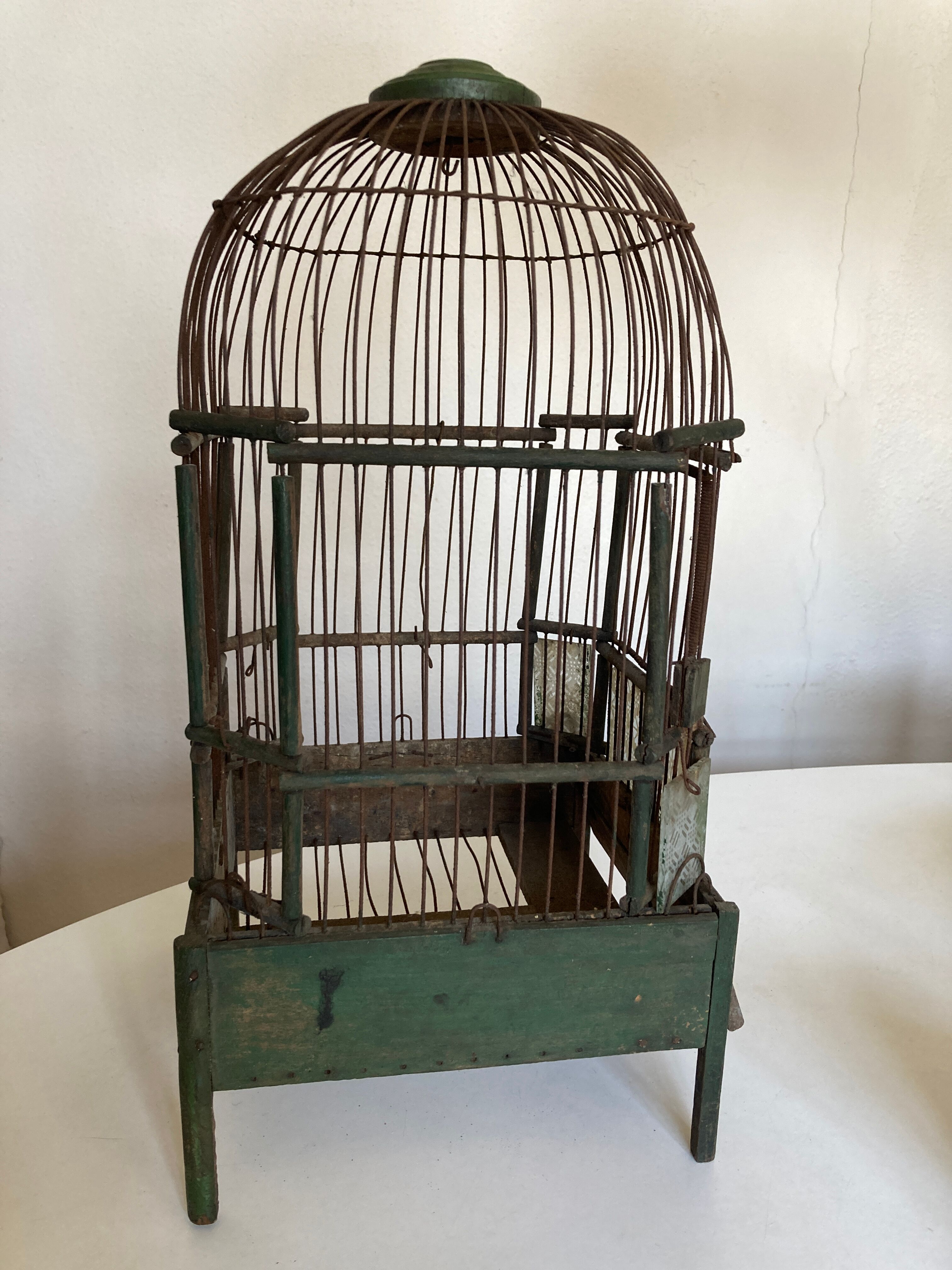 Octagonal bird cage made of wood and wire around 1920