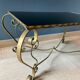 Table basse en métal doré et verre noir 1960