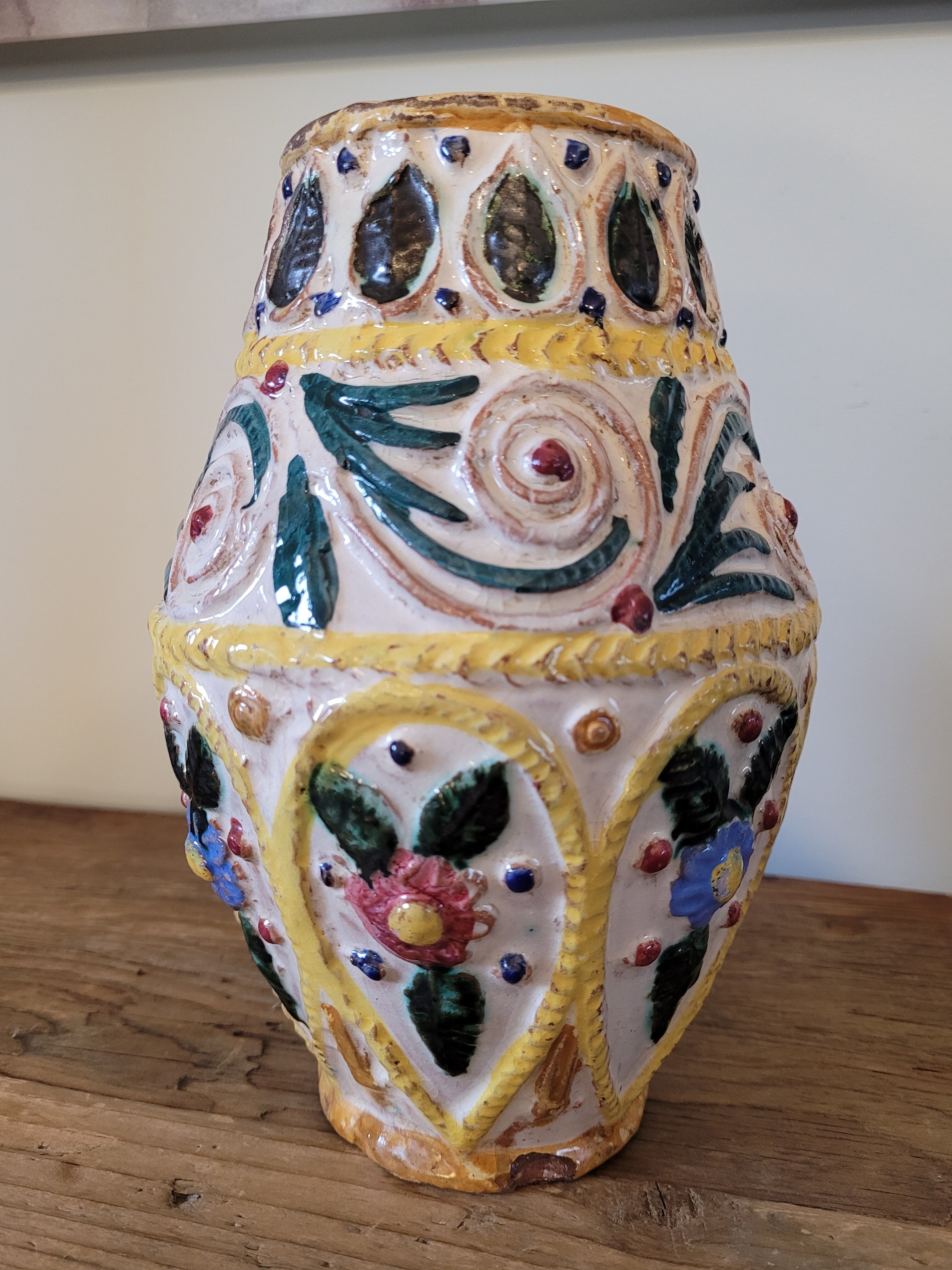 Hand-carved and hand-painted vase