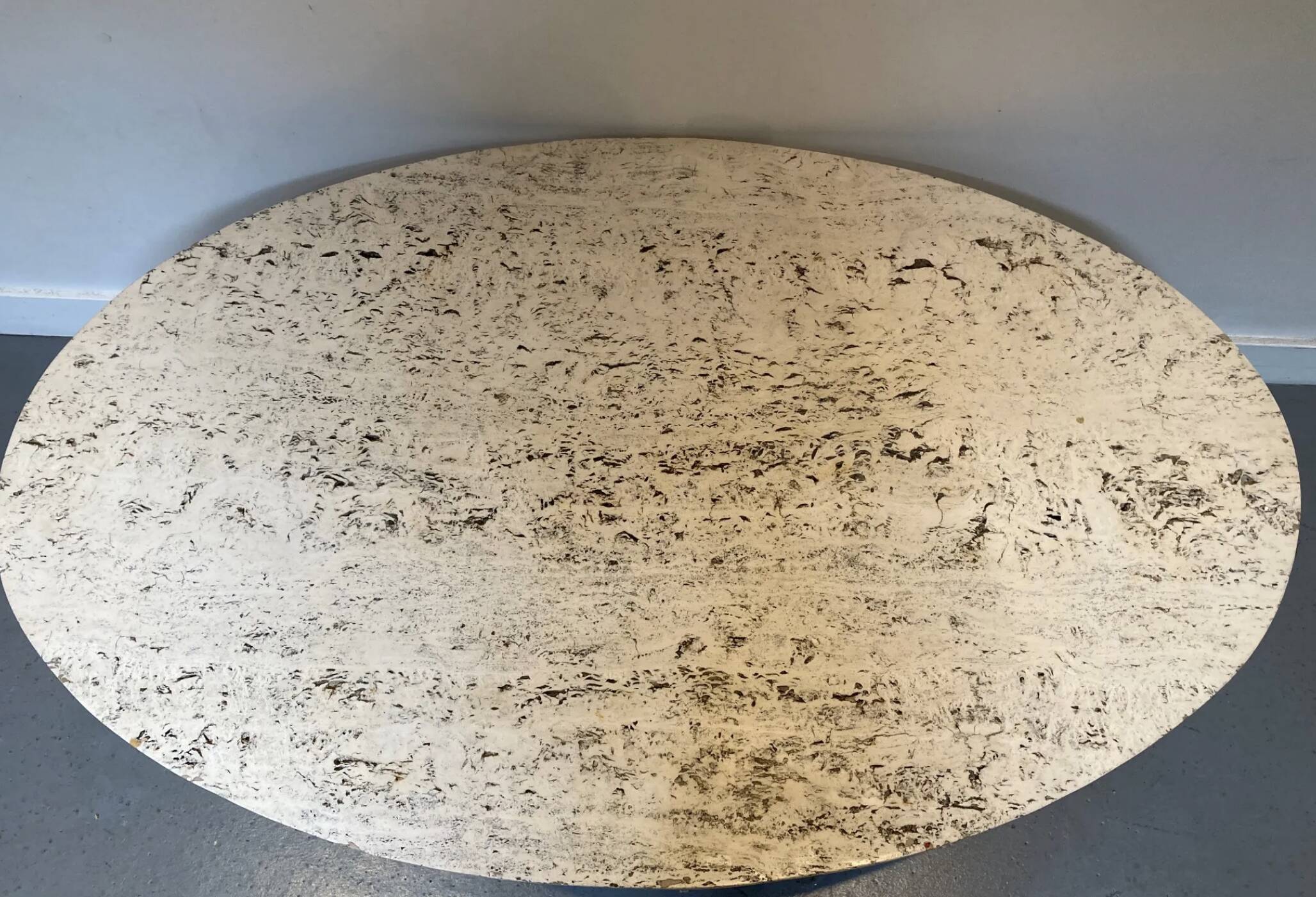 Oval coffee table in the style of Florence Knoll, marble/travertine top, piece.