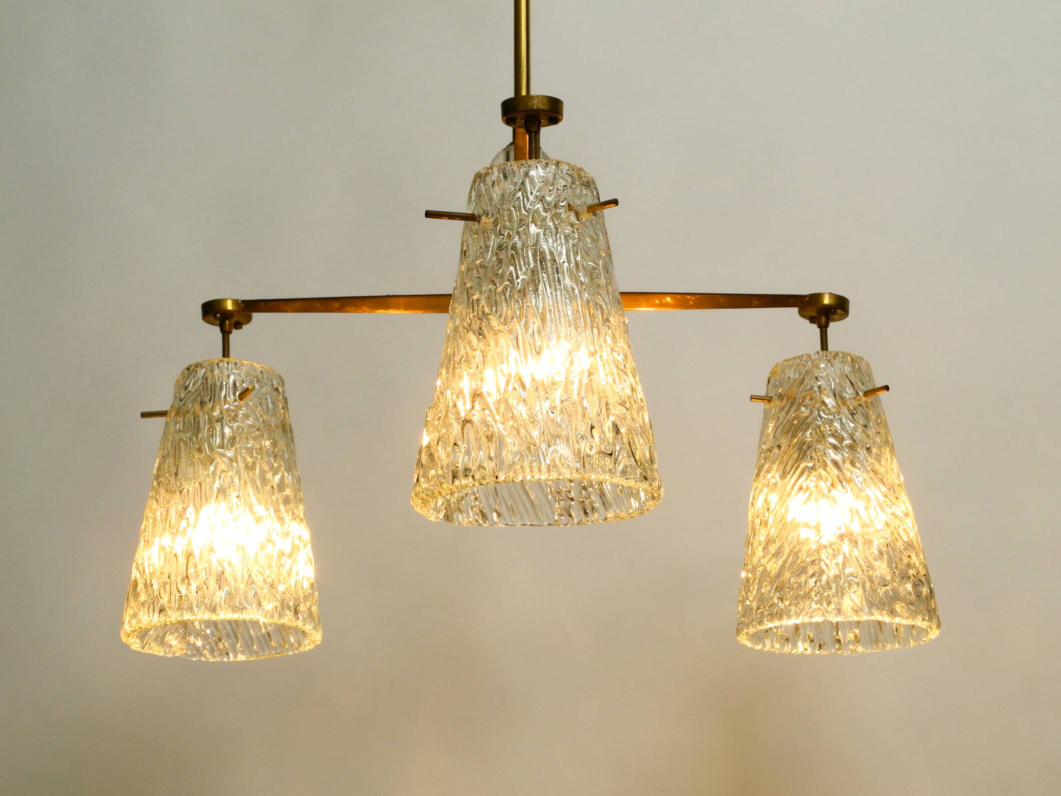 Heavy Mid Century ceiling lamp with three glass shades by Rupert Nikoll