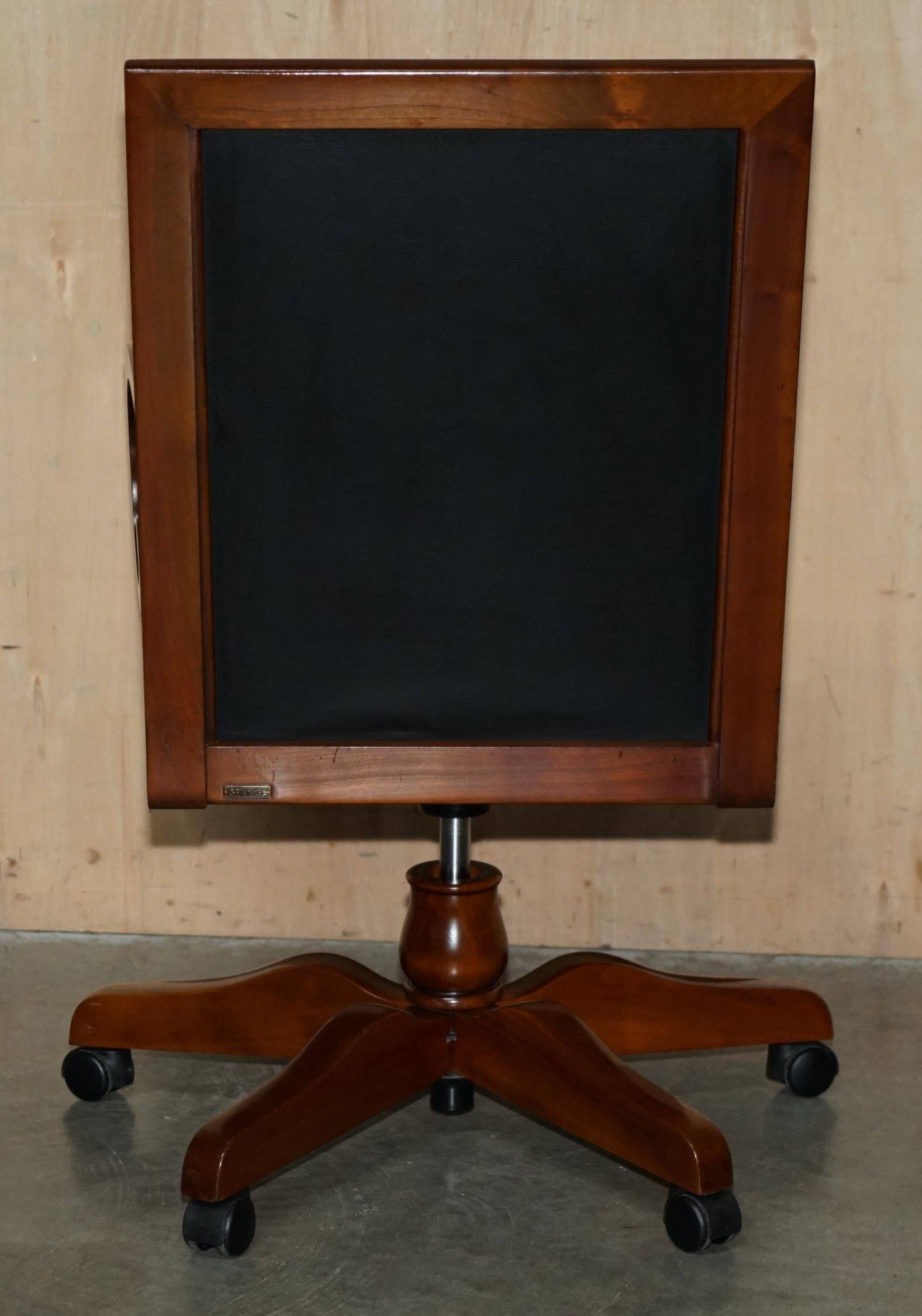 Captain's armchair in leather and cherry wood Grange Paris