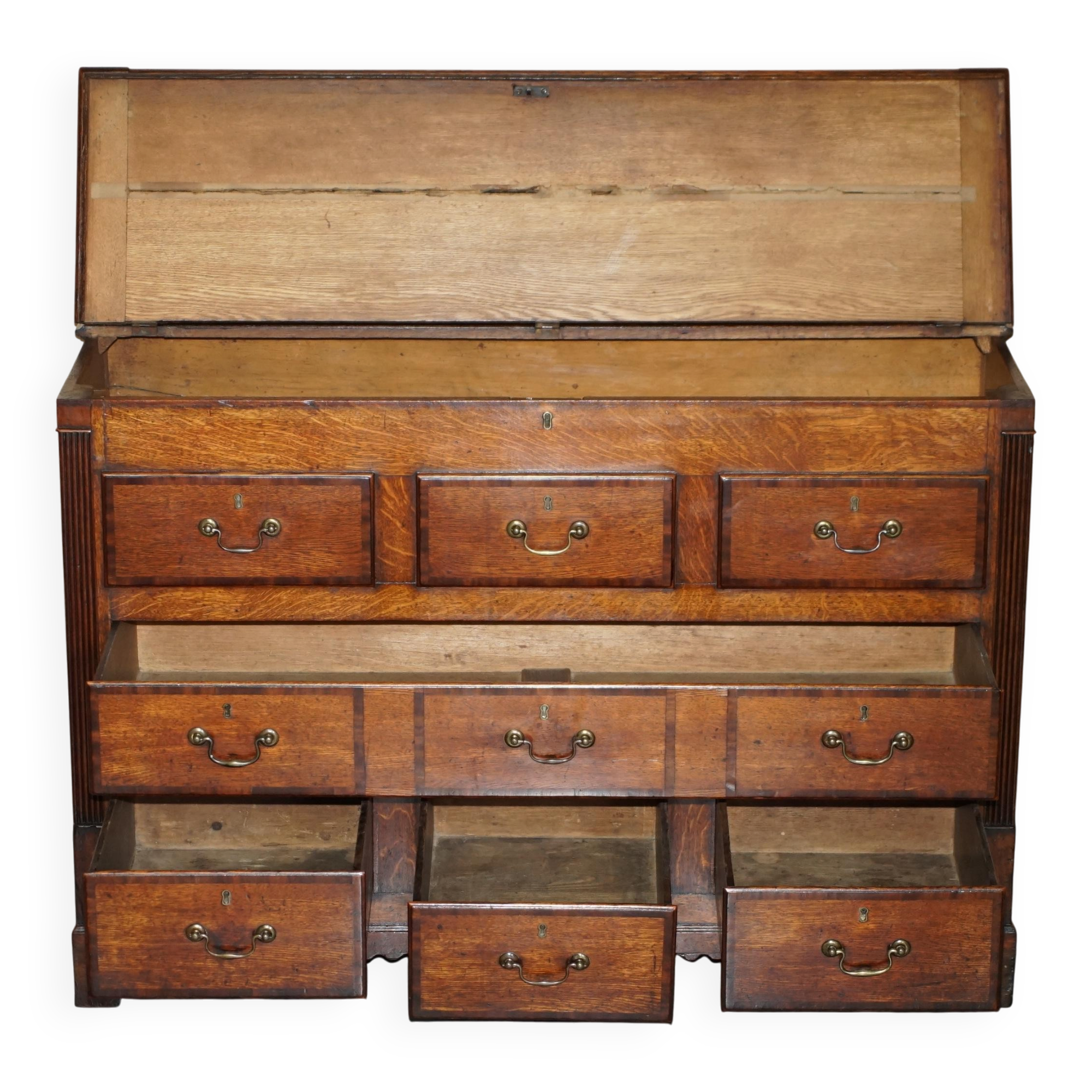 Georgian oak commode with a folding top, English, 18th century.