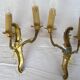 Pair of double wall lights in gilded bronze