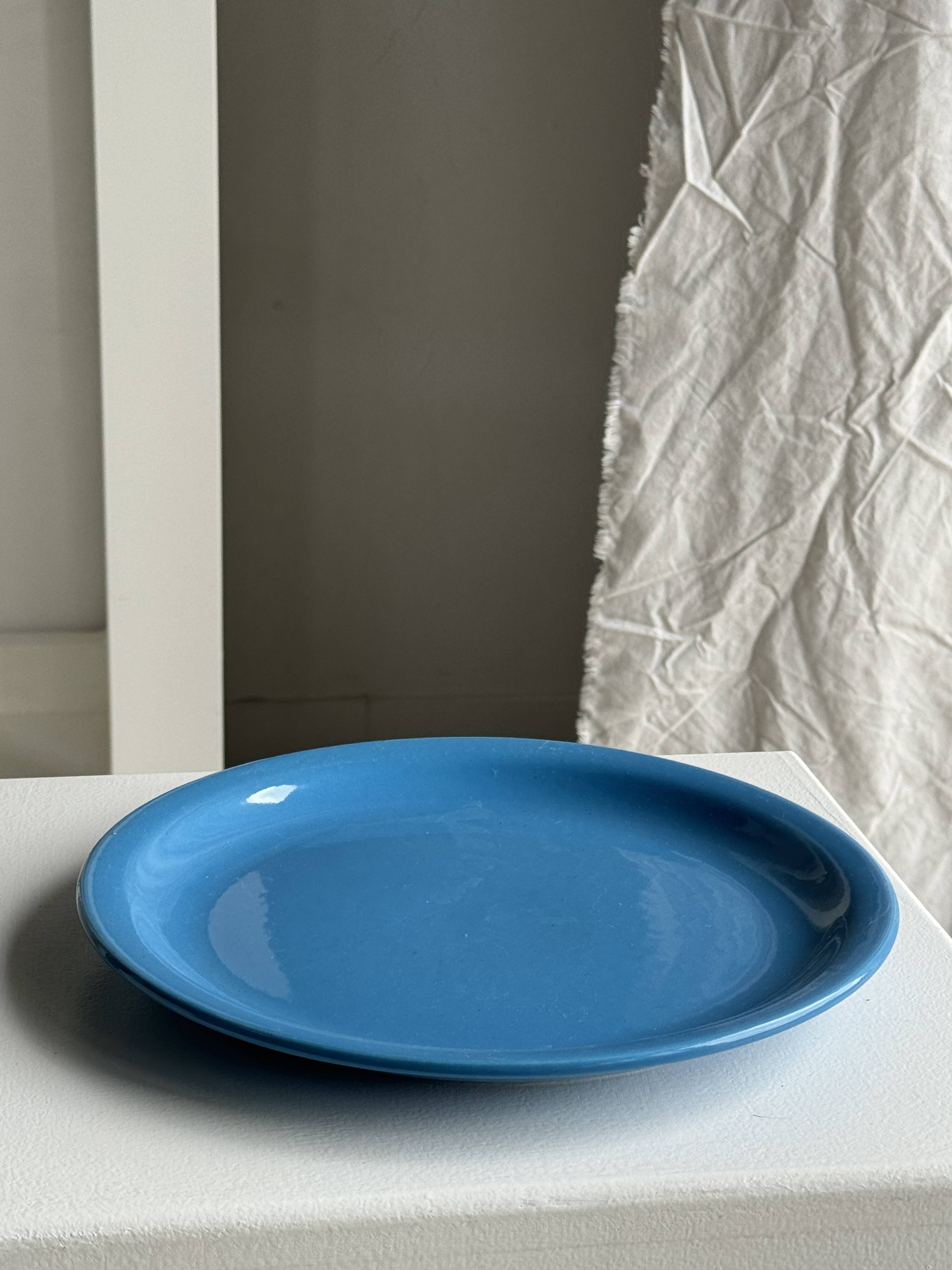 Set of 2 sky blue plates, one slotted