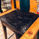 Antique bar stool with wooden seat