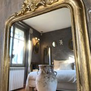 Antique Louis-Philippe gilded mirror from the late 19th century.