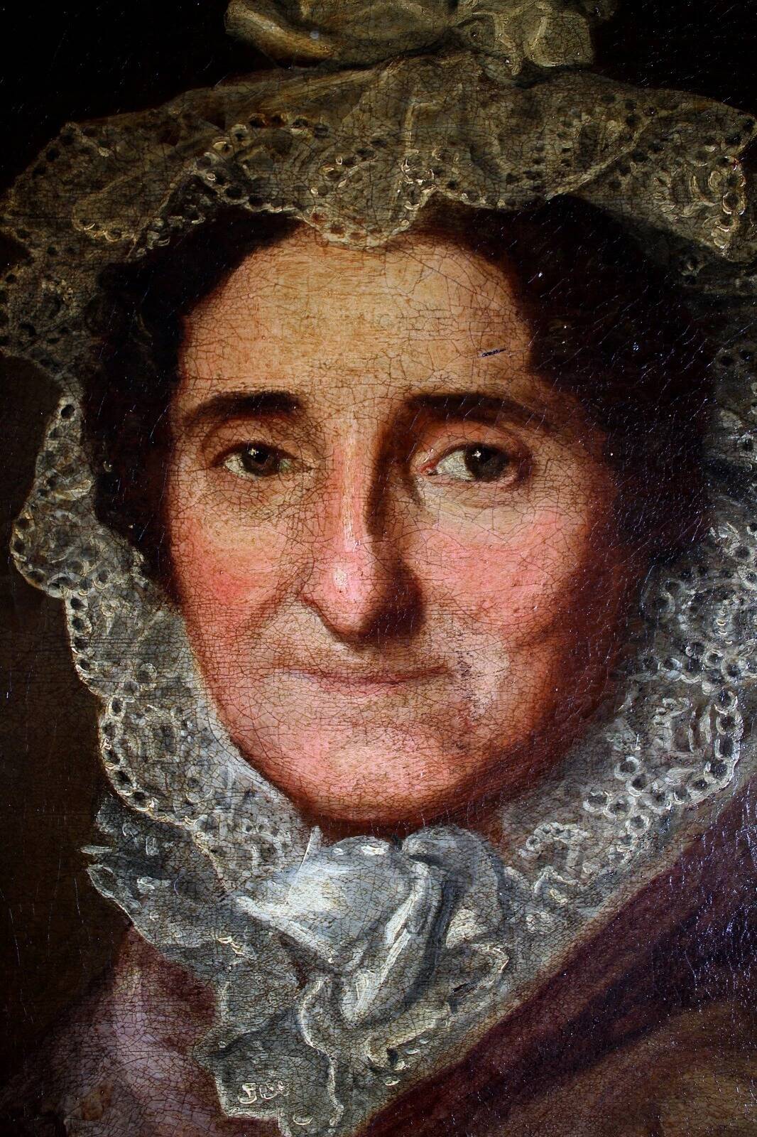 Tableau à l'huile ancien encadré d'or représentant le portrait d'une dame au chapeau