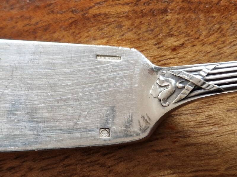 Christofle, Paris - Set of 12 fish knives - crossed ribbons model