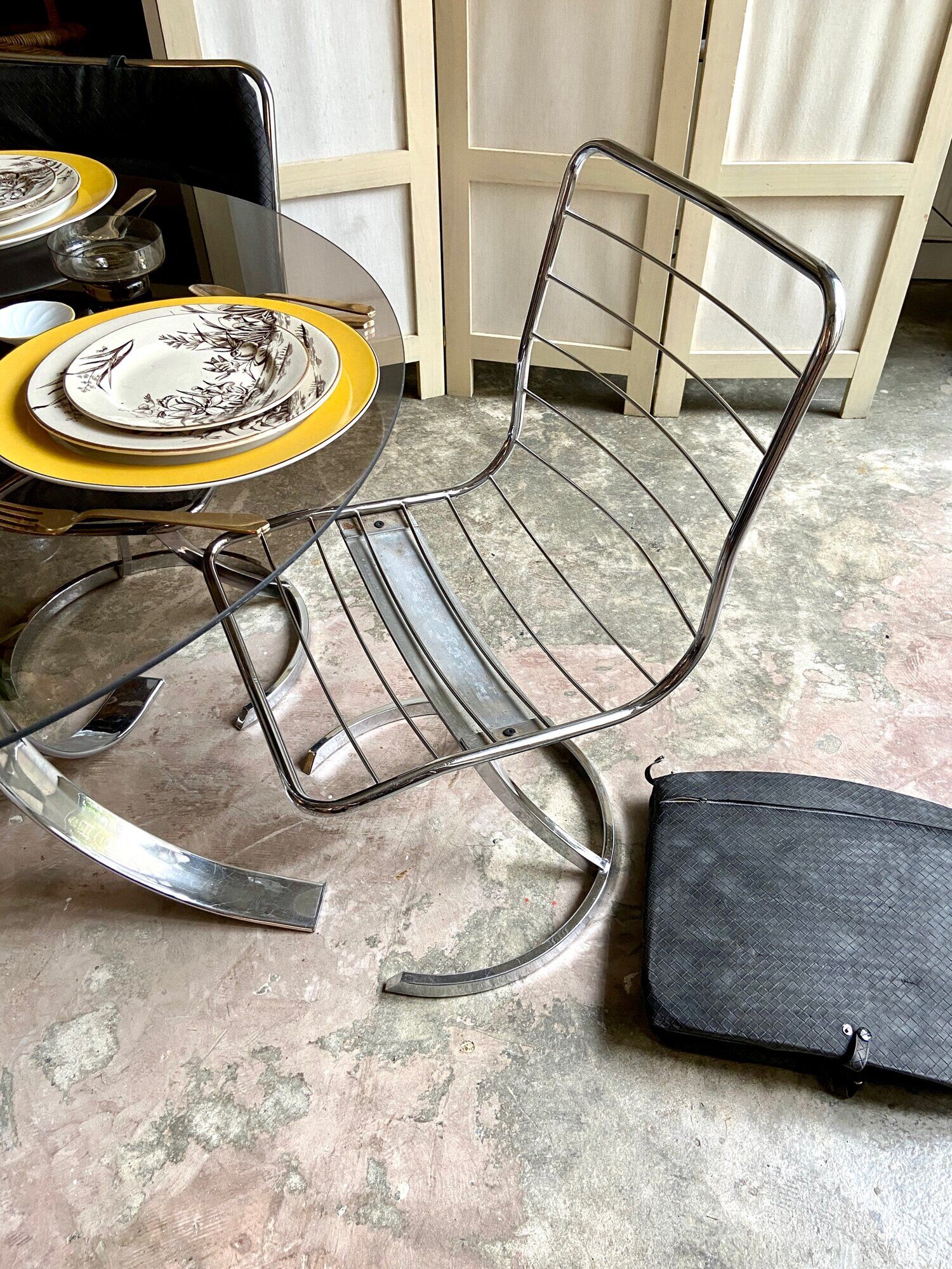 2 chairs in chromed metal and black woven skaï 1970s