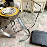 2 chairs in chromed metal and black woven skaï 1970s