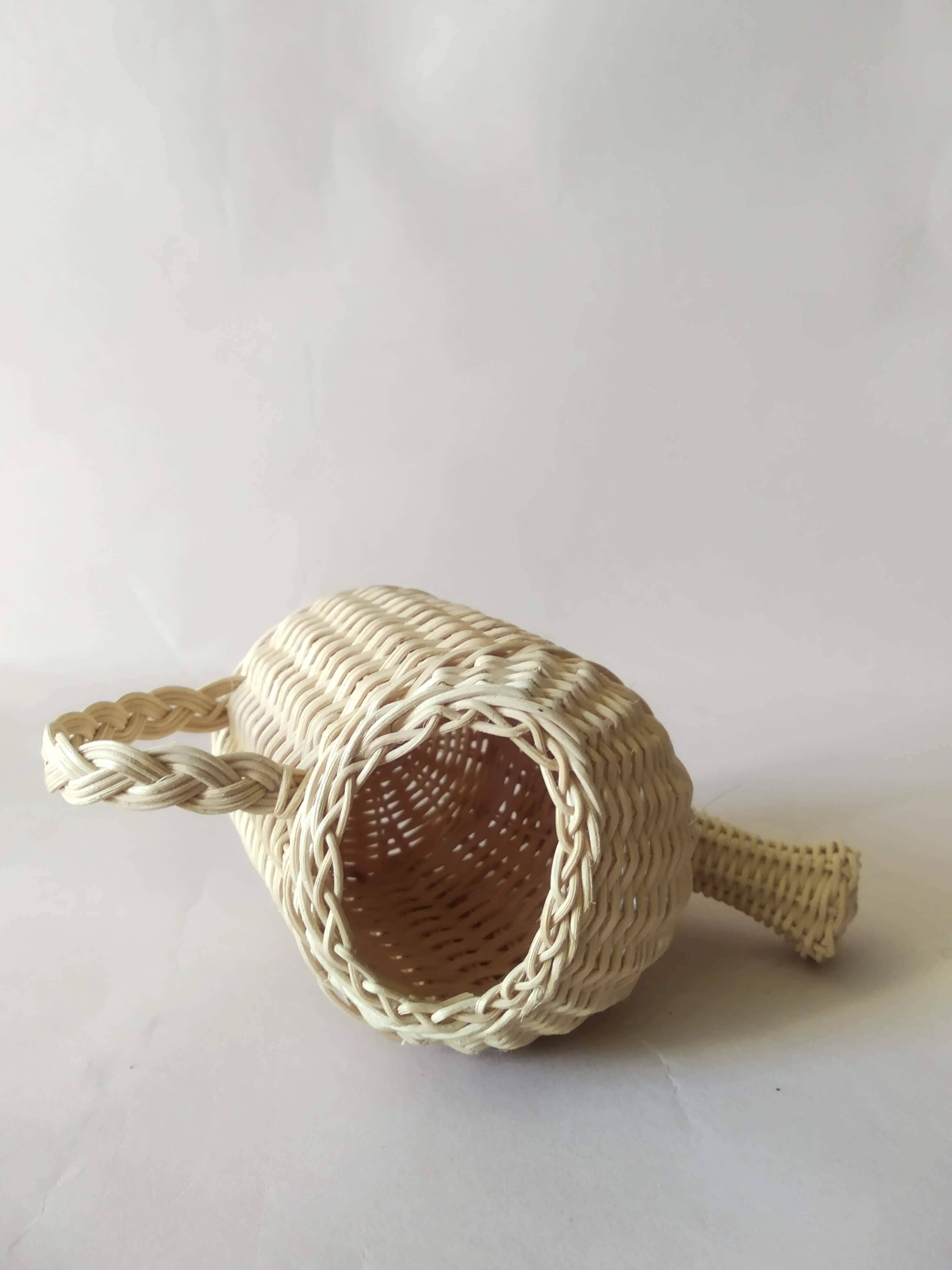Miniature rattan watering can