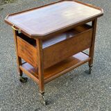 Vintage retractable tea trolley on wheels