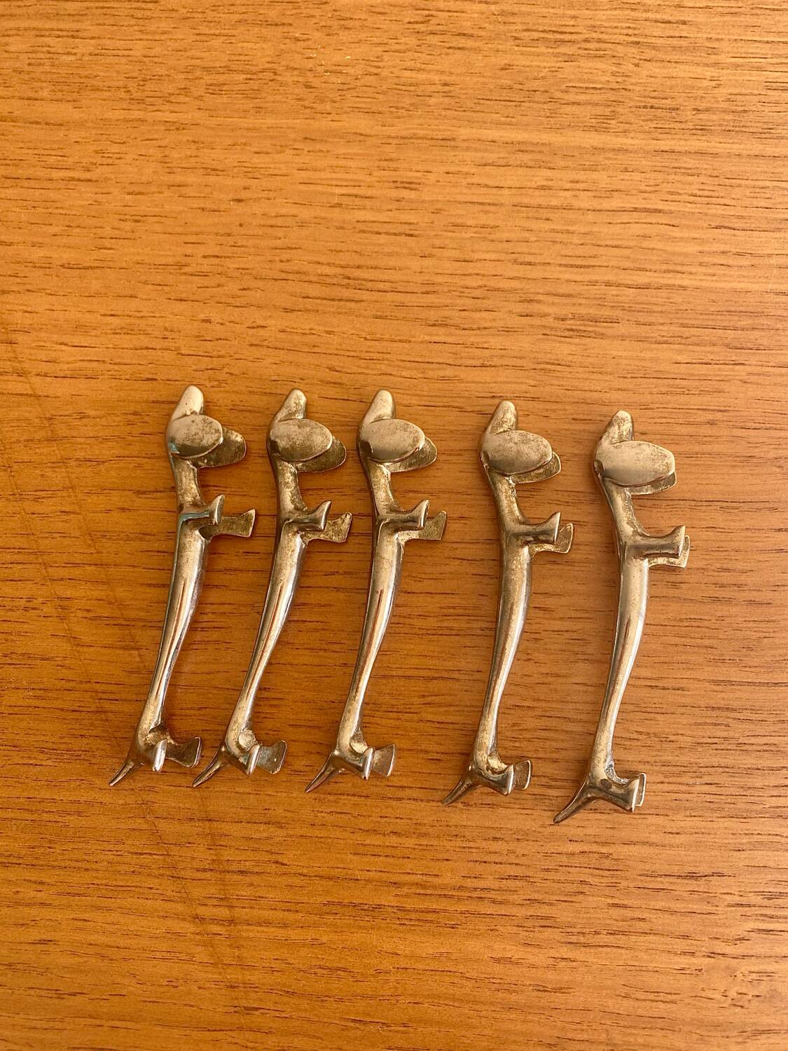 Vintage silver-plated dog knife rests
