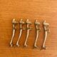 Vintage silver-plated dog knife rests