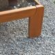 Coffee table from Regain in solid elm with a smoked glass top.