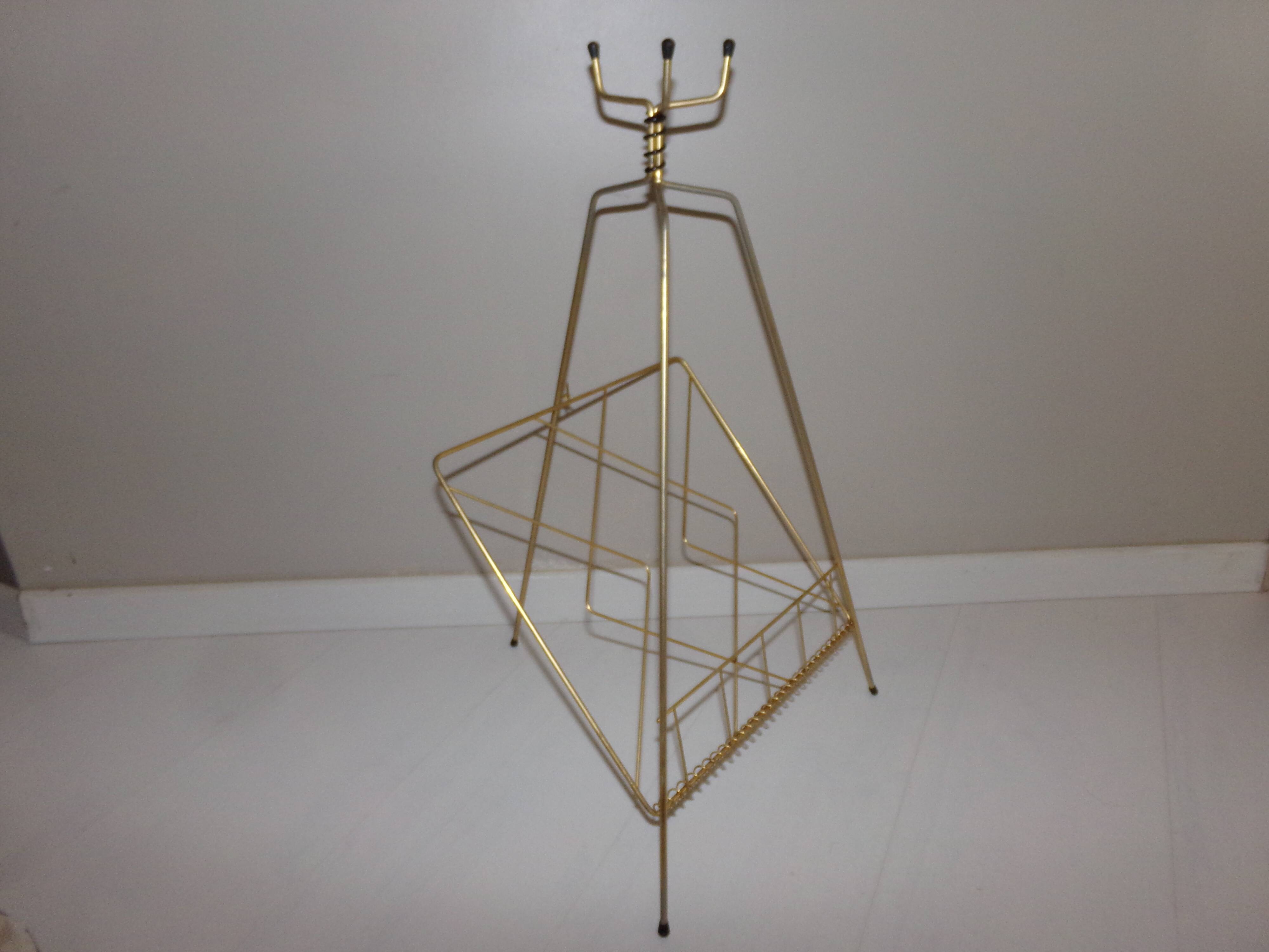 Vintage magazine holder in gold metal