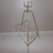 Vintage magazine holder in gold metal