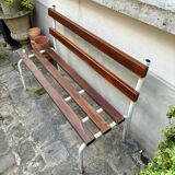 Bench in dark wood and white metal