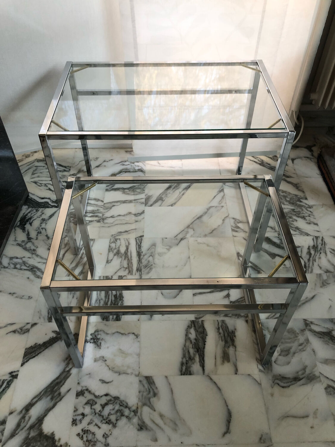 Nested tables in chrome metal and glass, Italy circa 1970.