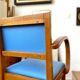 Bridge armchair in wood and blue skaï