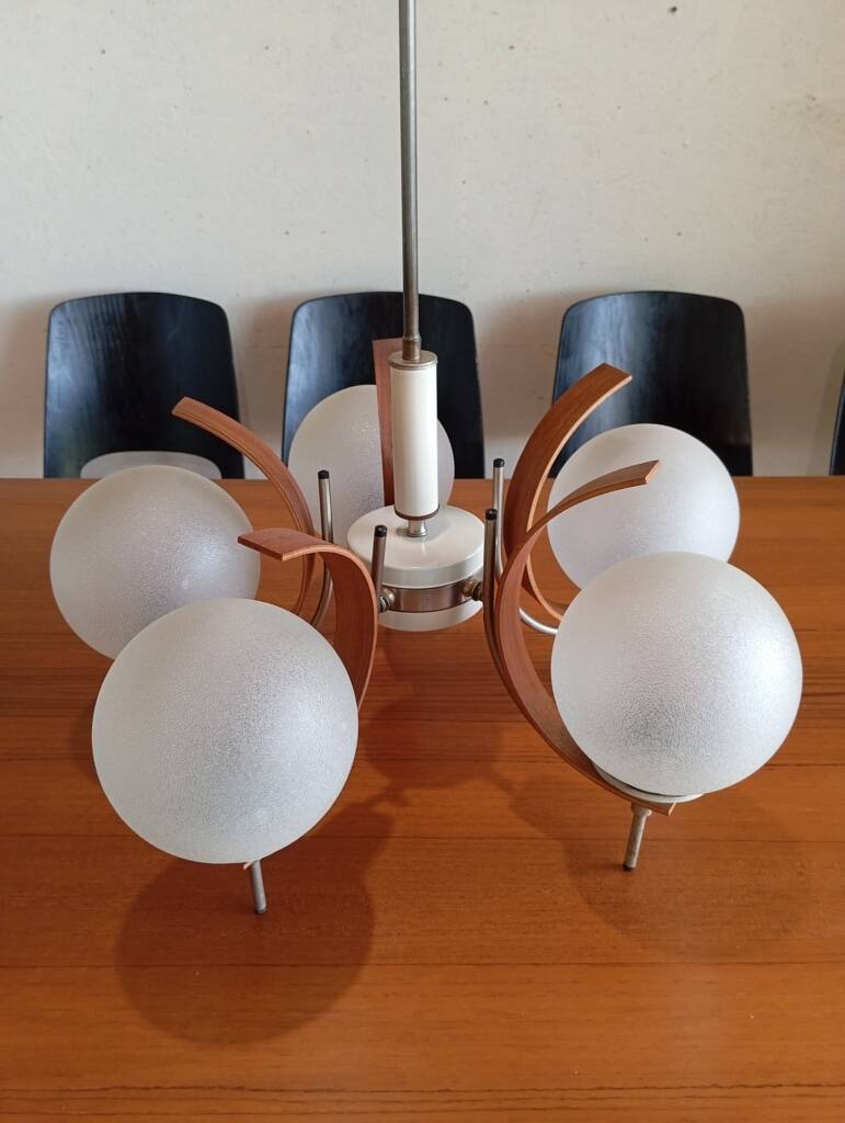 Scandinavian suspension in teak, glass, and metal.