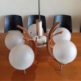 Scandinavian suspension in teak, glass, and metal.