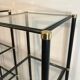Pair of black lacquered metal and brass shelves. Guy Lefèvre for Maison Jansen. Circa 1970.