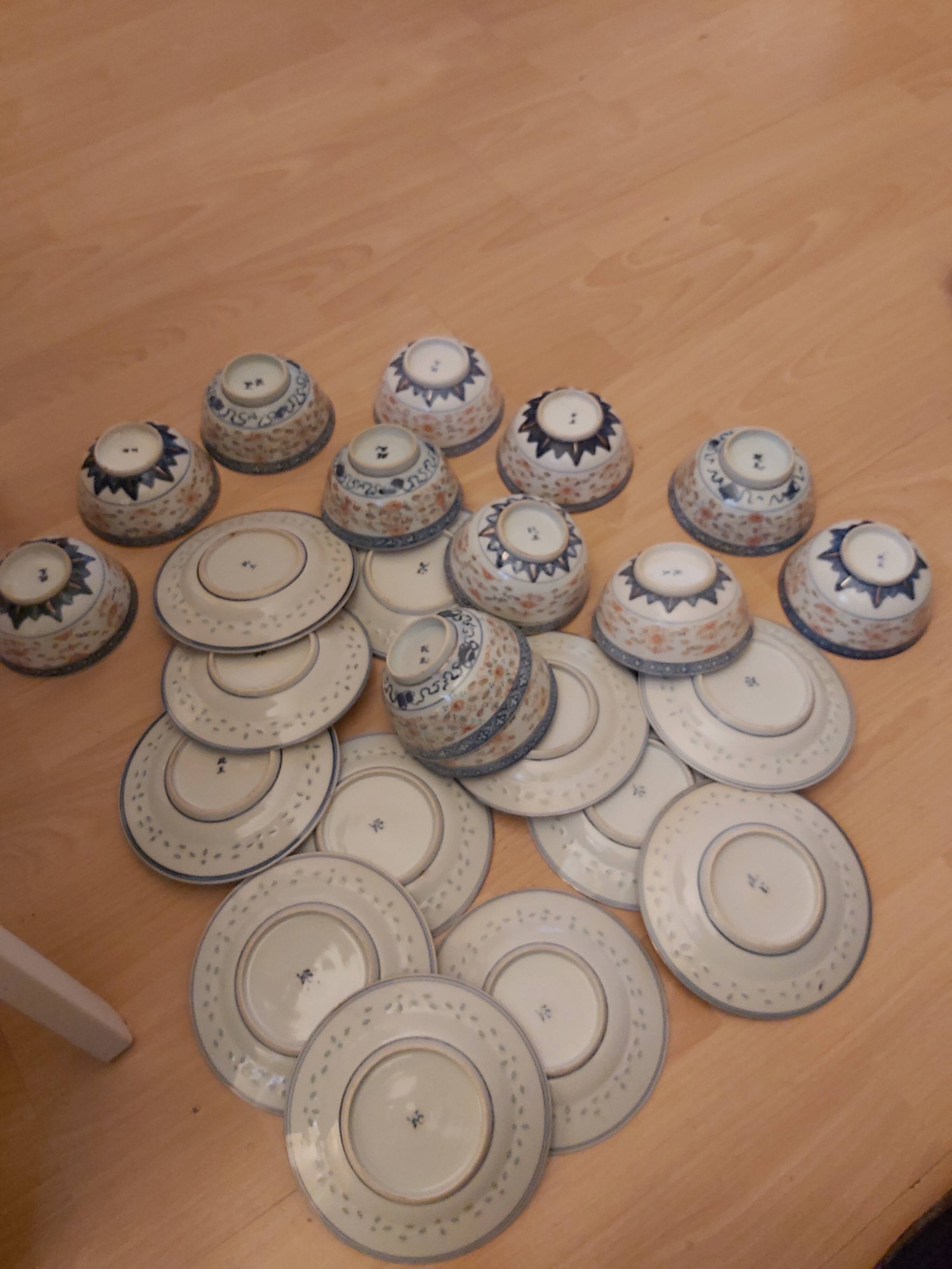 Service of 12 bowls and 12 under dishes in Chinese porcelain called rice seed of the 1960s