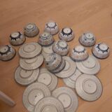 Service of 12 bowls and 12 under dishes in Chinese porcelain called rice seed of the 1960s