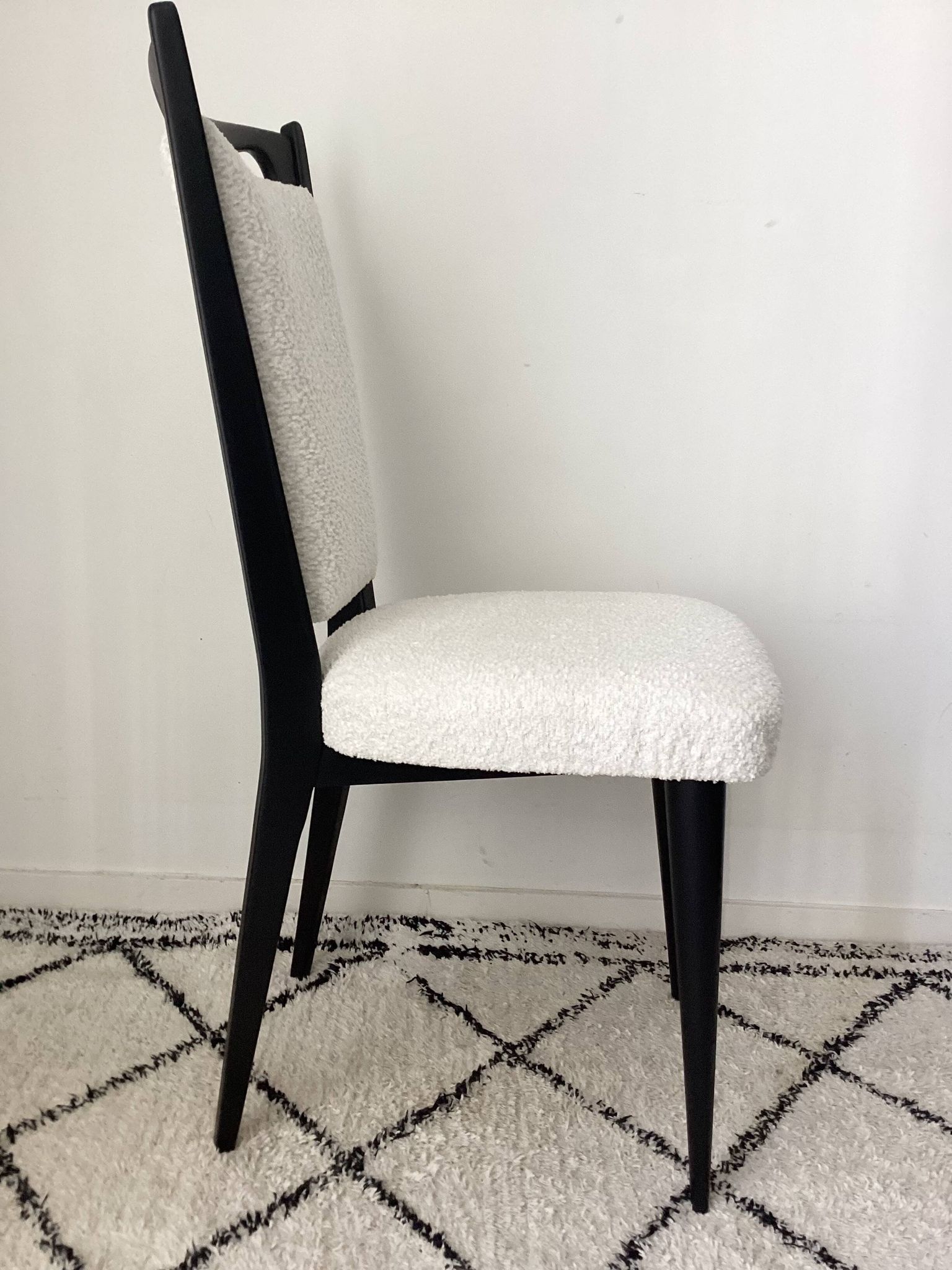 Fully restored vintage chair in boucle fabric.