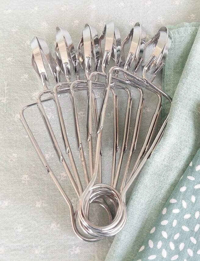 Vends lot de 11 pinces à escargots de la marque authentique Inox DCO - Arts de la table