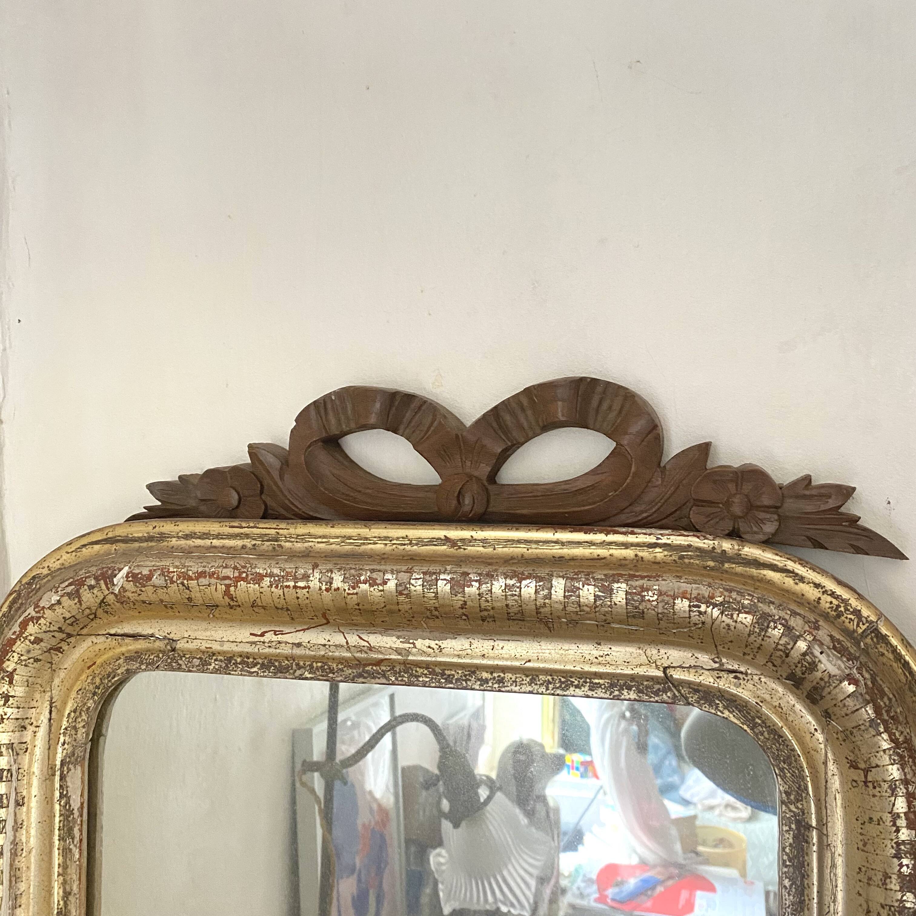 Antique carved wooden ribbon pediment