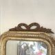 Antique carved wooden ribbon pediment