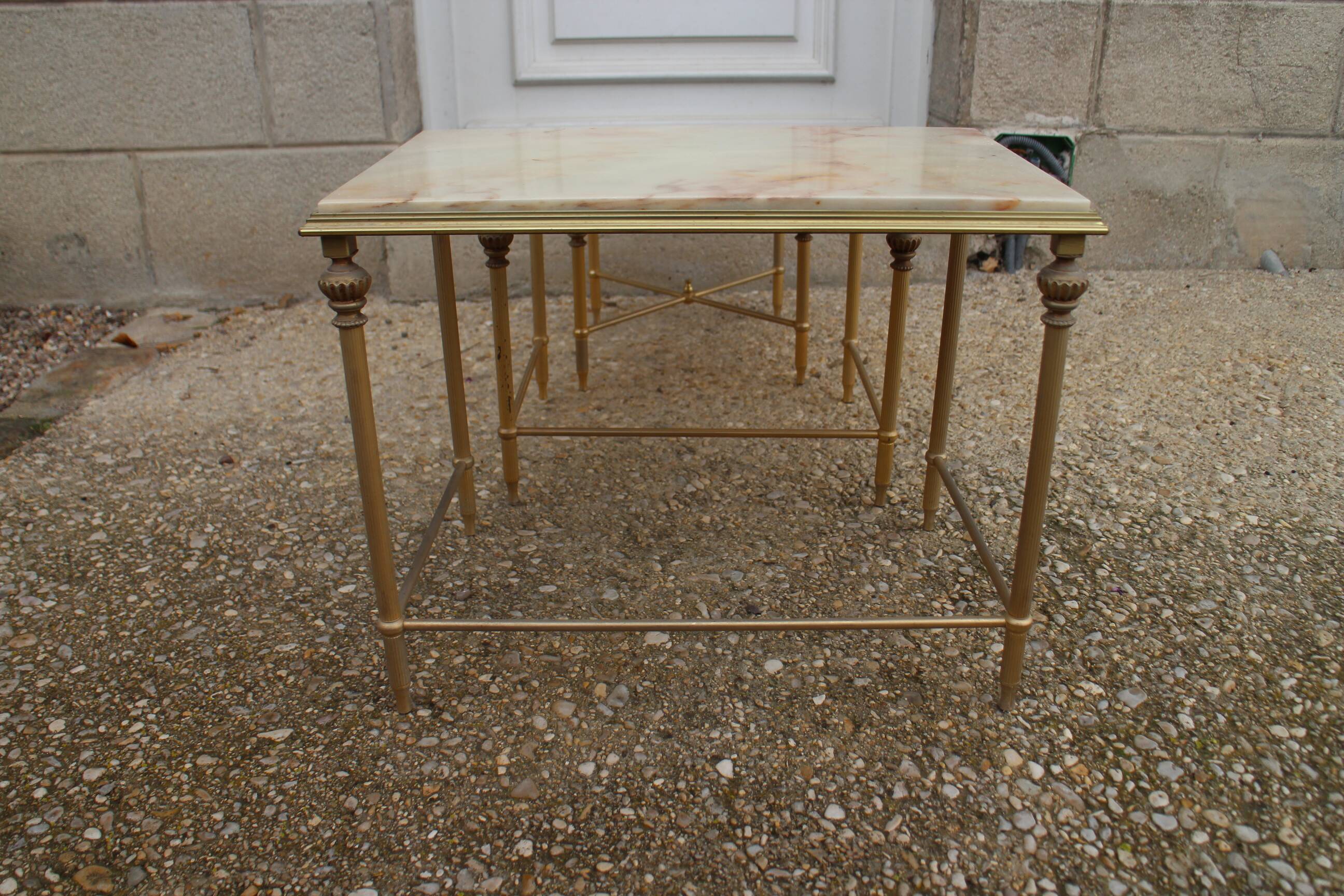 brass and onyx nesting table
