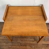 Modernist vintage chest of drawers in light chene has 3 drawers rattan top changing table
