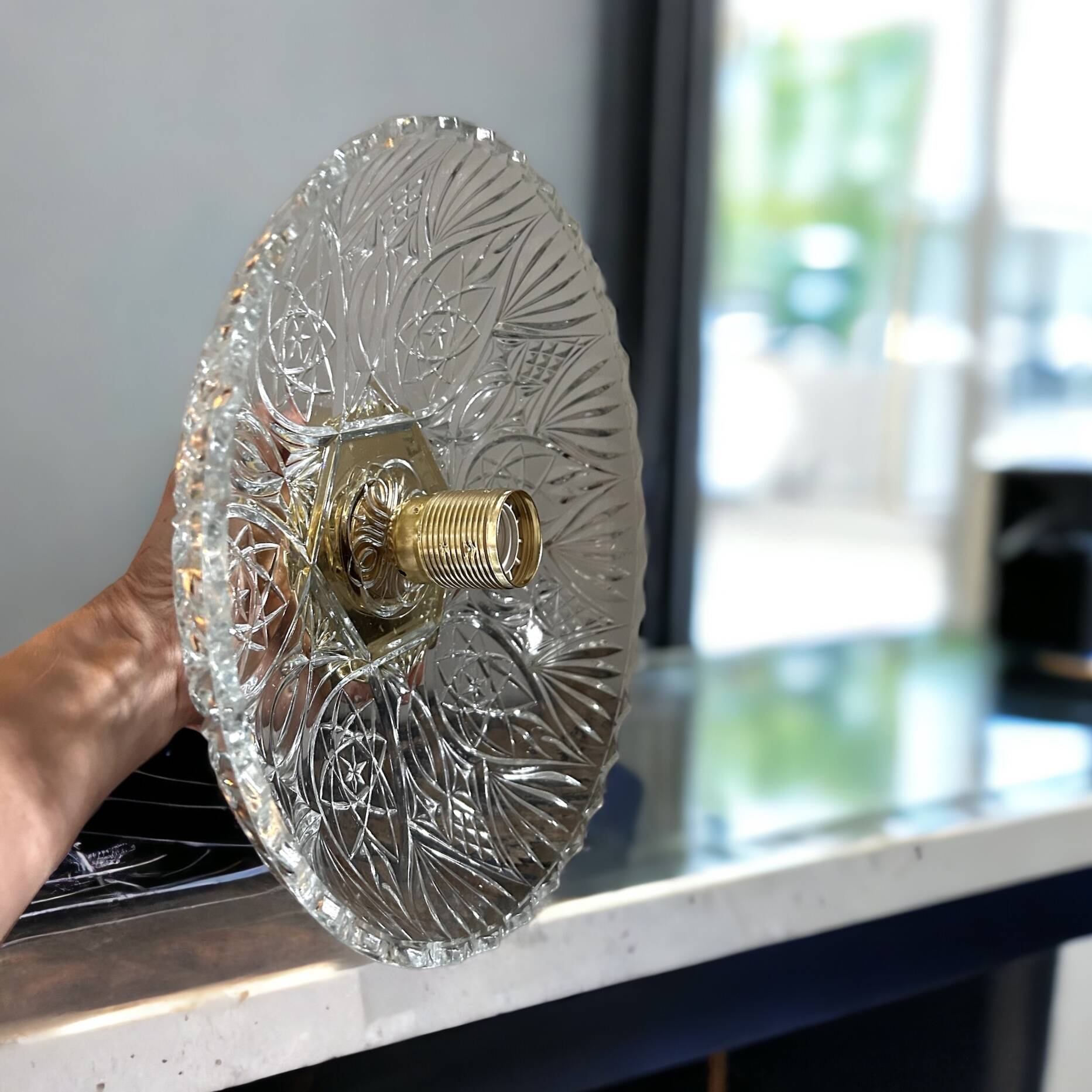 Large chiseled glass wall light