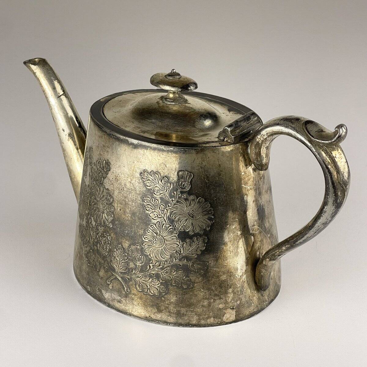 Antique silver-plated teapot from Sheffield, England, 1890-1910.