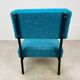 Modernist armchair from the 1950s in vintage blue boucle fabric.